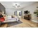 Spacious bedroom includes wood floors, tv, and golf equipment display at 1009 Hercules Dr, Indian Trail, NC 28079