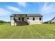 Charming home featuring a covered deck and spacious backyard perfect for outdoor enjoyment at 1019 Null Rd, Lincolnton, NC 28092
