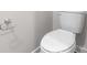 This bathroom features a standard white toilet and silver toilet paper holder at 1022 Jeffery Dean Ct, Albemarle, NC 28001