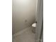 Neutral powder room featuring a single toilet and tile flooring at 1022 Jeffery Dean Ct, Albemarle, NC 28001