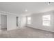 Spacious bedroom with plush carpet, natural light, and neutral color scheme at 1022 Jeffery Dean Ct, Albemarle, NC 28001