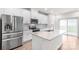 Modern kitchen boasts stainless steel appliances, granite countertops, and an island for food preparation and serving at 1022 Jeffery Dean Ct, Albemarle, NC 28001