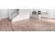Open living space featuring new floors and stairs leading to the second level of the home at 1022 Jeffery Dean Ct, Albemarle, NC 28001