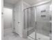 The shower is enclosed by a glass door at 1022 Jeffery Dean Ct, Albemarle, NC 28001