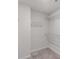 Large walk-in closet featuring multiple rows of shelving for ample storage space at 1022 Jeffery Dean Ct, Albemarle, NC 28001