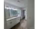 Large bathroom with double sinks, granite counters, and tiled shower is an owner's retreat at 11021 Scrimshaw Ln, Charlotte, NC 28215