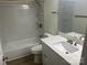 Bathroom featuring a tub with shower, toilet, mirror, and white cabinets with quartz countertops at 11021 Scrimshaw Ln, Charlotte, NC 28215