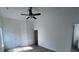 Bright bedroom featuring wood floors and a ceiling fan at 11021 Scrimshaw Ln, Charlotte, NC 28215
