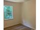 Bedroom with hardwood flooring, and one window providing natural light at 11021 Scrimshaw Ln, Charlotte, NC 28215