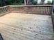 The exterior features a deck that's made of stained wood at 11021 Scrimshaw Ln, Charlotte, NC 28215