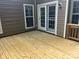 This deck has a wood railing and overlooks the backyard at 11021 Scrimshaw Ln, Charlotte, NC 28215