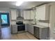 Modern kitchen featuring stainless steel appliances, granite countertops and subway tile backsplash at 11021 Scrimshaw Ln, Charlotte, NC 28215