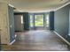 Open concept living area with a large bay window providing ample natural light at 11021 Scrimshaw Ln, Charlotte, NC 28215