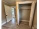 Bedroom with closet storage and updated flooring at 111 Rose St, Mount Holly, NC 28120