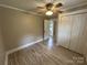 Bedroom features updated flooring and double-door closet at 111 Rose St, Mount Holly, NC 28120