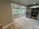 View of bright eat-in kitchen featuring stainless steel appliances and neutral paint at 111 Rose St, Mount Holly, NC 28120