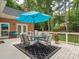 Charming back deck with comfortable seating and an outdoor dining area at 1140 Iverleigh Trl, Charlotte, NC 28270
