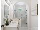 Modern bathroom featuring a glass shower, marble countertops, and stylish fixtures at 1140 Iverleigh Trl, Charlotte, NC 28270