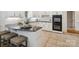 Beautiful kitchen featuring an island with seating, granite countertops, and modern appliances at 1140 Iverleigh Trl, Charlotte, NC 28270