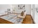 Bright home office with hardwood floors and stylish furniture at 1140 Iverleigh Trl, Charlotte, NC 28270