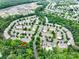 This aerial view shows the location of the property within a well-maintained neighborhood at 13909 Singleleaf Ln, Charlotte, NC 28278