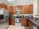Kitchen featuring stainless steel appliances and granite countertops at 13909 Singleleaf Ln, Charlotte, NC 28278