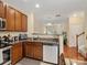 The kitchen features granite countertops and stainless steel appliances at 13909 Singleleaf Ln, Charlotte, NC 28278