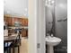 View of the kitchen adjacent to a half bath at 13909 Singleleaf Ln, Charlotte, NC 28278