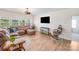 Spacious living room with comfortable sectional sofa and stylish decor at 1391 Links Crossing Dr, Monroe, NC 28112