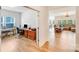 Bright home office with natural light and a view into the adjacent living room at 1391 Links Crossing Dr, Monroe, NC 28112