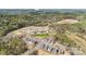 Aerial view showing new homes, green spaces, and future construction in a thriving community at 1479 Hubert Graham Way, Tega Cay, SC 29708