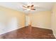 Bedroom with wood floors, spacious closet, and lots of natural light at 1545 Chadmore Nw Ln, Concord, NC 28027