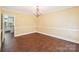 Dining room with chandelier and neutral wall color at 1545 Chadmore Nw Ln, Concord, NC 28027