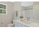 Bathroom featuring a vanity with sink, toilet and shower at 19010 Oakhurst Blvd, Cornelius, NC 28031