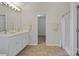 Bathroom showcasing a double vanity and shower at 19010 Oakhurst Blvd, Cornelius, NC 28031