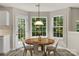 Cozy breakfast nook with a round table, ample windows, and a view of the outdoors at 19010 Oakhurst Blvd, Cornelius, NC 28031