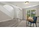 Bright foyer with hardwood floors, white trim, and staircase leading to the second floor at 19010 Oakhurst Blvd, Cornelius, NC 28031