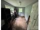 Bright bedroom with a window, gray walls, and overhead lighting at 2116 Dana Pl, Shelby, NC 28152
