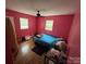 Bedroom with a bed, hardwood floors, and two windows at 2116 Dana Pl, Shelby, NC 28152
