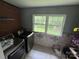 This well-equipped laundry room features modern appliances and ample space for sorting and folding clothes at 2116 Dana Pl, Shelby, NC 28152