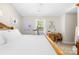 Bright, airy bedroom with desk, wall art, and a serene feel at 2490 Hawk Ridge Dr, Gastonia, NC 28056