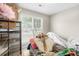 Bright storage room filled with boxes and containers; needs some organizing at 2490 Hawk Ridge Dr, Gastonia, NC 28056