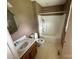 Functional bathroom with a tub and shower combination, vanity with sink, and toilet at 2547 Nc 182 Hwy, Lincolnton, NC 28092