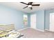 This is a bedroom featuring blue walls and a ceiling fan at 2720 Watergarden St, York, SC 29745