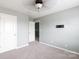 This bedroom features a ceiling fan and a view into another room at 2720 Watergarden St, York, SC 29745