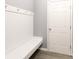 Functional mudroom with a built-in bench, coat hooks, and a convenient doorway at 2720 Watergarden St, York, SC 29745