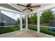 Cozy screened patio with ceiling fan overlooking the yard at 2720 Watergarden St, York, SC 29745