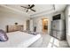 Inviting main bedroom showing a view of ensuite bath, tray ceiling and soft, neutral hues at 3041 Winged Teal Ct, Belmont, NC 28012