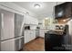 Spacious kitchen with stainless steel appliances, granite countertops, and white subway tile at 3500 Colony Rd # B, Charlotte, NC 28211