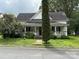 Charming two-story home with a covered front porch and mature landscaping at 65 Maynard Ave, Ansonville, NC 28170